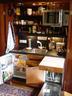 The kitchenette fully loaded with fresh luxury food / wines / drinks all included