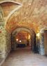 Restored stone walls and vaulted ceilings