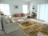 Comfortable Family Room with patio doors to pool terrace