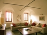 The main lounge with vaulted ceiling and comfortable furnish