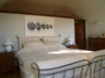 The master bedroom with walk-in wardrobe