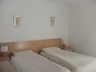 Airy twin bedroom