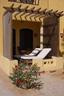 Terrace with wooden sunbeds.Just a few steps from the pool