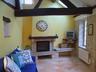 Overview of sitting room with fireplace