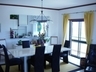 dining room with granite breakfast bar in kitchen