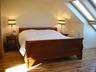 Large Bedroom with 6' sleigh bed and ensuite and walk in war