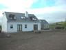 Back view of Beenbane Lodge and patio