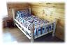 Twin size White Cedar Log Bed in the Loft overlooking the Great Room