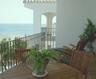 Large balcony with teak furniture and a fabulous view of the