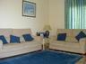 Large lounge with soft furnishings and views to the Med