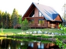 Click to enlarge log home and cottage rentals in front of water. in Ste-Christine D'Auvergne,Quebec