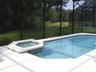 Large screened pool jacuzzi with oversized decking