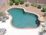 Private backyard with lagoon style pool