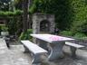 Stone Table & Benches in BBQ Area with Breathtaking Views of Lake & Mountains.  Great place for a glass of Prosecco or Aperitivo Before Dining!