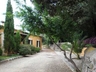 Sideview of  driveway and Villa