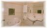 del Bonfigli Luxury apartment . The bathroom with angular jacuzzi for 2 people 