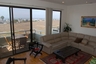 Living room with ocean view and balcony