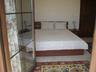 Double bedroom with french doors opening onto sea view balconny