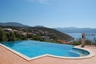 Large infinity edge pool with steps leading into the water