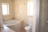 Family bathroom with circular bath & seperate shower