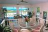 View of the dining area and large designer decorated living