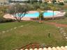 View of pool and garden from balcony