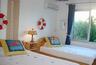Air-conditioned 3rd bedroom - 2 large single beds + pullout bed