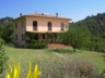 Villa L'Arco with the spacious veranda leading onto the lawn