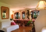 Air Con Living Room: glass door leading onto the veranda