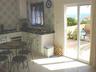 Dining / kitchen area with view to Pool & Sea