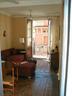 The livingroom with two sunny balconies.