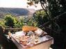 look over the terrace to the valley beach in background