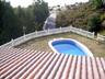 View of the Pool and the Sea from the Upstairs Terrace.