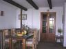 Dining Area with Stairs Down.