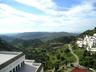 View from the terrace over open countryside to the sea.