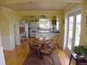 Another view into the kitchen from dining area