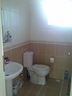 The bathroom is fully fitted and is a wet room.