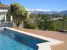 Pool overlooking Sierra Nevado packed with snow