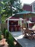 Outdoor bar and raised deck with Dining area for up to 10 guests