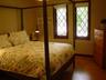 Queen guestroom with poster bed