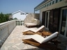 Sun loungers on balcony