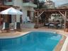 Pool and outside dining area, covered for shade