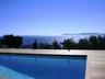 View over pool deck to sea and islands