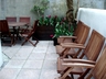 Garden patio seating for 10 with barbeque area