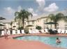Heated swimming pool & jacuzzi with condo at rear centre of