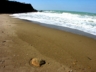 private beach in front of villa