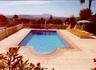 Pool has a large sunbathing terrace with views across valley